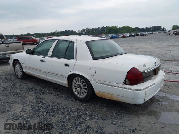 2010 Mercury Grand Marquis LS z VIN 2MEBM7FV5AX606873, wystawiony jako IAAI lot #42216310 z przebiegiem 198 896 mil mil oraz . Historia ofert i sprzedaży dostępna na DreamBid. Obrazek 3.