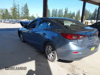 2014 Mazda 3 i Touring with VIN JM1BM1V72E1149391, listed as a IAAI auction lot 42056873 with 147,363 mi miles and . Bid and sale history available at DreamBid. Image 3.
