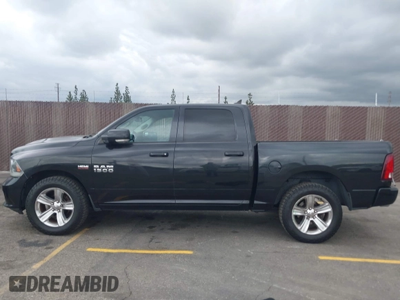 2015 Ram 1500 Sport with VIN 1C6RR6MT9FS613551, listed as a IAAI auction lot 42068675 with 199,576 mi miles and . Bid and sale history available at DreamBid. Image 14.