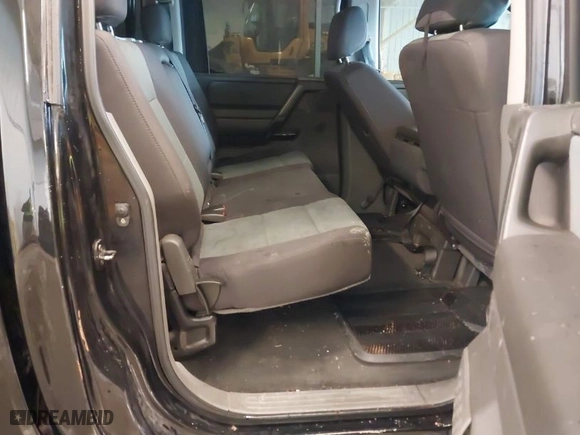 2007 Nissan Titan LE with VIN 1N6BA07B77N242856, listed as a IAAI auction lot 41496692 with 243,803 mi miles. Bid and sale history available at carsss.com. Image 8.