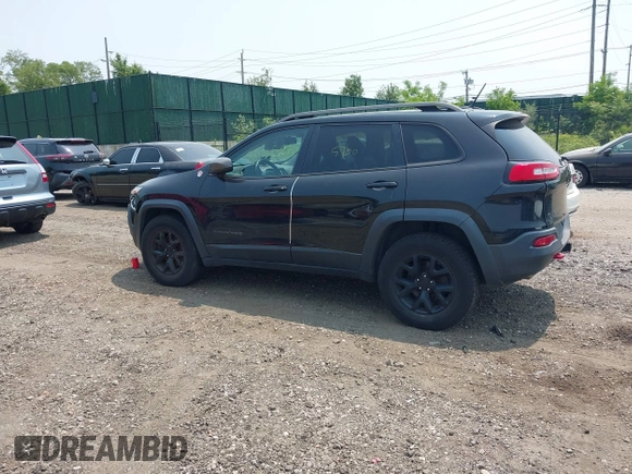 2014 Jeep Cherokee Trailhawk with VIN 1C4PJMBS8EW285276, listed as a IAAI auction lot 42408796 with Not provided miles and . Bid and sale history available at DreamBid. Image 13.