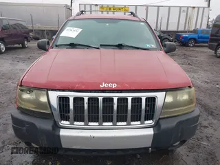 2004 Jeep Grand Cherokee Laredo with VIN 1J4GW48S94C151816, listed as a IAAI auction lot 41983332 with 151,227 mi miles. Bid and sale history available at carsss.com. Image 12.