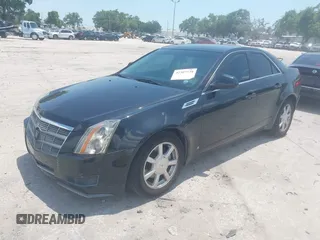 2009 Cadillac CTS RWD z VIN 1G6DF577190151588, wystawiony jako IAAI lot #42307738 z przebiegiem 185 441 mil mil oraz . Historia ofert i sprzedaży dostępna na DreamBid. Obrazek 2.