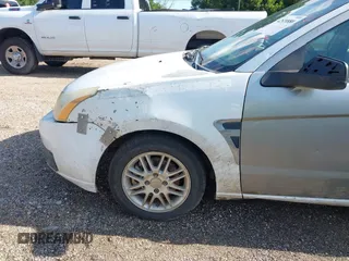 2008 Ford Focus SE with VIN 1FAHP35N08W296432, listed as a IAAI auction lot 42520880 with 195,266 mi miles and . Bid and sale history available at DreamBid. Image 6.