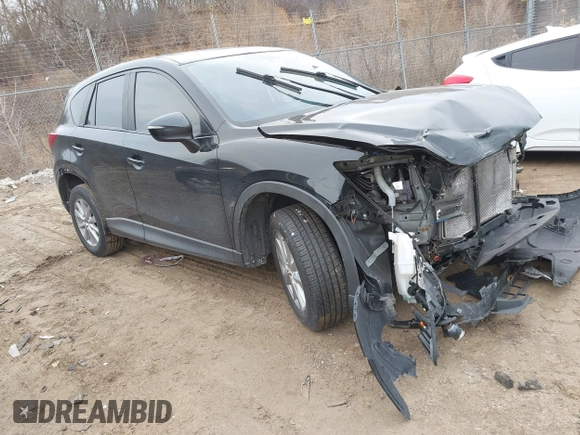 2015 Mazda CX-5 Sport with VIN JM3KE4BY9F0495948, listed as a IAAI auction lot 41501840 with 145,959 mi miles. Bid and sale history available at carsss.com. Image 1.