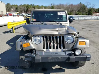 2004 Jeep Wrangler Sahara с VIN 1J4FA59S04P717093, выставлен на аукционе Copart как лот 64961095 с пробегом 151 944 миль миль и На запчасти • Non repairable. История ставок и продаж доступна на DreamBid. Изображение 5.