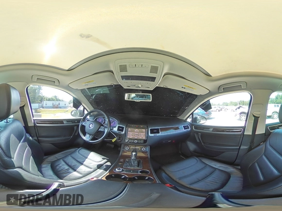 2015 Volkswagen Touareg Lux с VIN WVGEP9BP4FD004212, выставлен на аукционе Copart как лот 54021345 с пробегом 156 164 миль миль и Списание • Salvage title. История ставок и продаж доступна на DreamBid. Изображение 16.