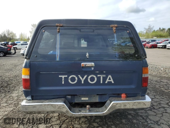 1990 Toyota Pickup DX с VIN JT4RN81P7L5065454, выставлен на аукционе Copart как лот 52913465 с пробегом 366 591 миль миль и Списание • Salvage title. История ставок и продаж доступна на DreamBid. Изображение 6.