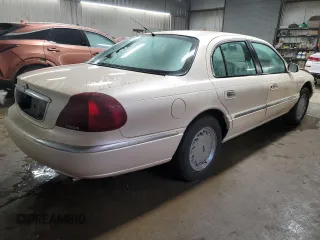 1998 Lincoln Continental with VIN 1LNFM97V9WY604317, listed as a Copart auction lot 83999234 with 91,277 mi miles and Salvage Title. Bid and sale history available at carsss.com. Image 3.