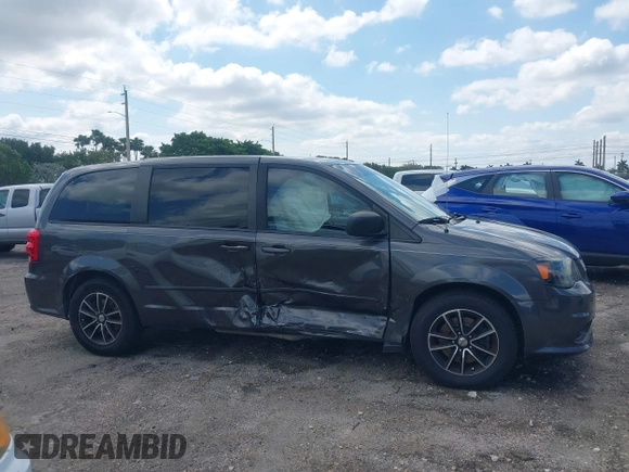 2015 Dodge Grand Caravan American Value with VIN 2C4RDGBGXFR682995, listed as a IAAI auction lot 41994708 with 142,725 mi miles and . Bid and sale history available at DreamBid. Image 13.