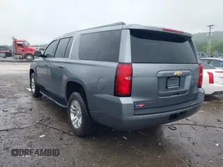 2019 Chevrolet Suburban LT with VIN 1GNSKHKCXKR405555, listed as a IAAI auction lot 42188860 with 143,435 mi miles and . Bid and sale history available at DreamBid. Image 3.