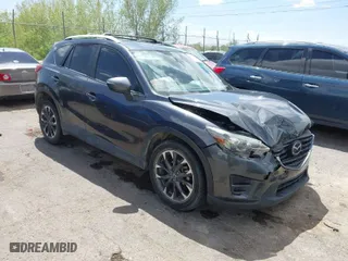 2016 Mazda CX-5 Grand Touring with VIN JM3KE4DY7G0643643, listed as a IAAI auction lot 42077497 with 120,343 mi miles. Bid and sale history available at carsss.com. Image 1.