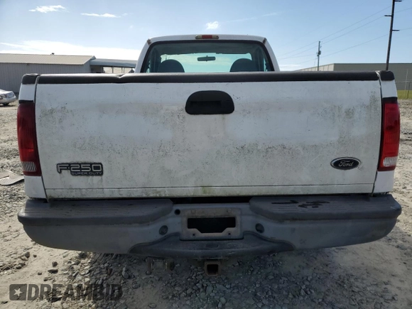 2002 Ford Super Duty F-250 XL with VIN 1FTNF20L22ED69572, listed as a Copart auction lot 80442804 with 218,461 mi miles and Salvage Title. Bid and sale history available at carsss.com. Image 6.