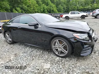 2019 Mercedes-Benz E-Class E 450 with VIN WDD1J6JB7KF102986, listed as a Copart auction lot 57220704 with 66,159 mi miles and Salvage Title. Bid and sale history available at carsss.com. Image 4.