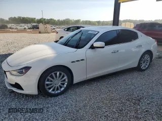 2014 Maserati Ghibli z VIN ZAM57XSA5E1081980, wystawiony jako Copart lot #53546905 z przebiegiem 60 019 mil mil oraz Tytuł czysty. Historia ofert i sprzedaży dostępna na DreamBid. Obrazek 1.