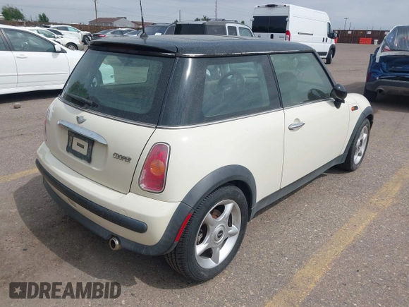 2004 MINI Hardtop with VIN WMWRC334X4TJ56384, listed as a IAAI auction lot 42581423 with 79,129 mi miles and . Bid and sale history available at DreamBid. Image 4.