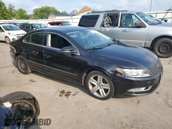 2014 Volkswagen CC R-Line with VIN WVWBP7AN2EE507967, listed as a Copart auction lot 65423594 with 121,212 mi miles and Salvage Title. Bid and sale history available at carsss.com. Image 4.