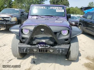 2018 Jeep Wrangler JK Unlimited Sport S with VIN 1C4BJWDGXJL911081, listed as a Copart auction lot 69205464 with 117,576 mi miles and Salvage Title. Bid and sale history available at carsss.com. Image 5.