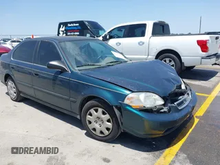 1998 Honda Civic LX z VIN 1HGEJ6671WL011642, wystawiony jako IAAI lot #42308904 z przebiegiem 77 380 mil mil oraz . Historia ofert i sprzedaży dostępna na DreamBid. Obrazek 1.