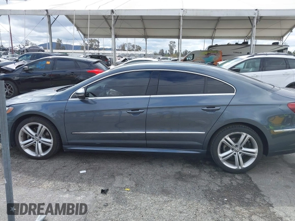 2013 Volkswagen CC Sport with VIN WVWBP7AN3DE571837, listed as a IAAI auction lot 41784447 with 156,834 mi miles. Bid and sale history available at carsss.com. Image 14.