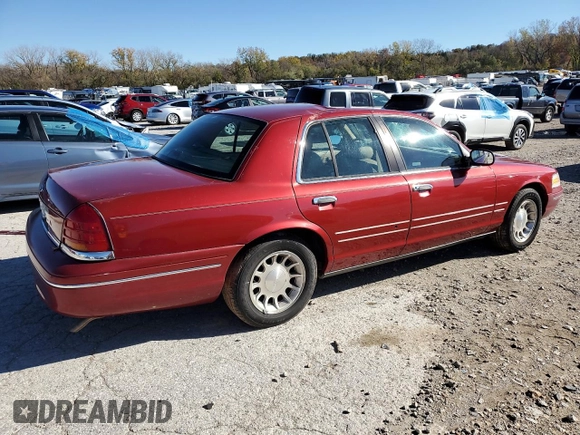 1998 Ford Crown Victoria LX с VIN 2FAFP74W4WX118422, выставлен на аукционе Copart как лот 78716184 с пробегом 70 214 миль миль и Списание • Salvage title. История ставок и продаж доступна на DreamBid. Изображение 3.