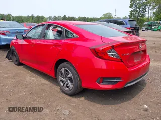 2020 Honda Civic LX with VIN 2HGFC2F64LH586907, listed as a IAAI auction lot 42419728 with 61,288 mi miles and . Bid and sale history available at DreamBid. Image 3.