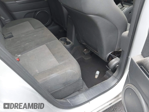 2012 Jeep Compass Sport with VIN 1C4NJCBA5CD622424, listed as a IAAI auction lot 42211700 with 120,945 mi miles and . Bid and sale history available at carsss.com. Image 8.