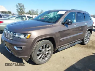 2017 Jeep Grand Cherokee Overland z VIN 1C4RJECG0HC960178, wystawiony jako IAAI lot #42315844 z przebiegiem 63 271 mil mil oraz . Historia ofert i sprzedaży dostępna na DreamBid. Obrazek 19.