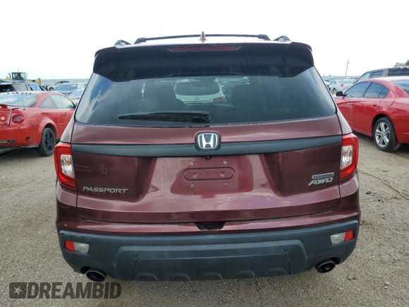 2019 Honda Passport Touring с VIN 5FNYF8H97KB016820, выставлен на аукционе Copart как лот 61562855 с пробегом 41 772 миль миль и Списание • Salvage title. История ставок и продаж доступна на DreamBid. Изображение 6.