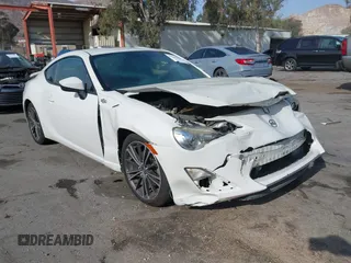 2015 Scion FR-S z VIN JF1ZNAA17F8708414, wystawiony jako IAAI lot #41206489 z przebiegiem 150 045 mil mil oraz . Historia ofert i sprzedaży dostępna na DreamBid. Obrazek 1.