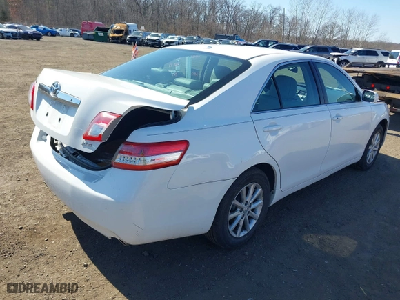 2011 Toyota Camry LE with VIN 4T1BK3EK0BU609935, listed as a IAAI auction lot 41773867 with 93,094 mi miles. Bid and sale history available at carsss.com. Image 4.
