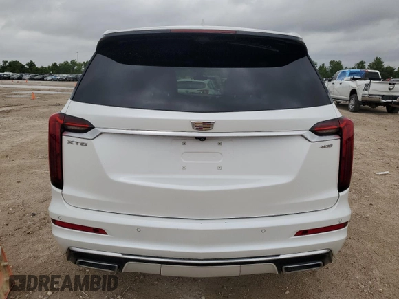 2021 Cadillac XT6 Premium Luxury with VIN 1GYKPCRSXMZ169206, listed as a Copart auction lot 55953525 with 64,789 mi miles and Salvage Title. Bid and sale history available at DreamBid. Image 6.