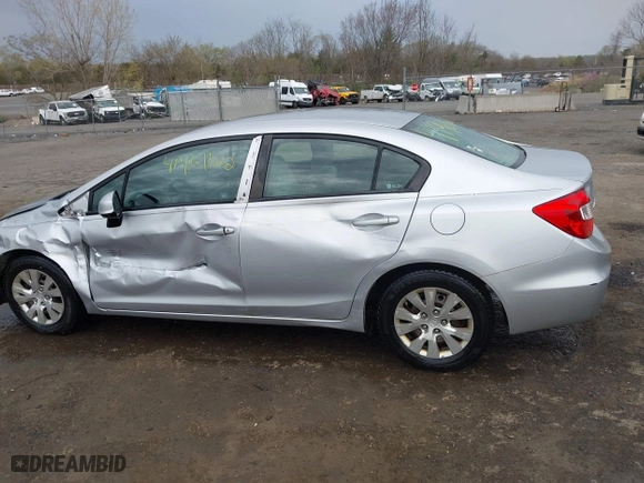 2012 Honda Civic Sdn LX with VIN 19XFB2F50CE353837, listed as a IAAI auction lot 41961162 with 140,583 mi miles. Bid and sale history available at carsss.com. Image 15.