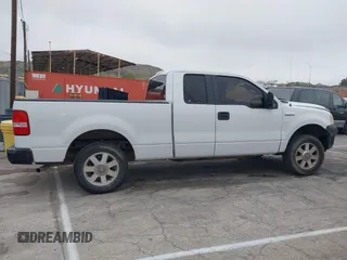 2007 Ford F-150 STX with VIN 1FTRX12W57FA45095, listed as a IAAI auction lot 41880108 with 168,216 mi miles and . Bid and sale history available at DreamBid. Image 13.