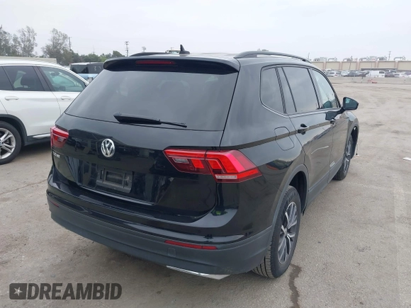 2021 Volkswagen Tiguan S with VIN 3VV1B7AX4MM025586, listed as a IAAI auction lot 41889996 with 21,777 mi miles and . Bid and sale history available at DreamBid. Image 4.
