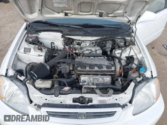 1997 Honda Civic EX z VIN 1HGEJ8143VL028501, wystawiony jako IAAI lot #42058395 z przebiegiem 129 401 mil mil oraz . Historia ofert i sprzedaży dostępna na DreamBid. Obrazek 10.