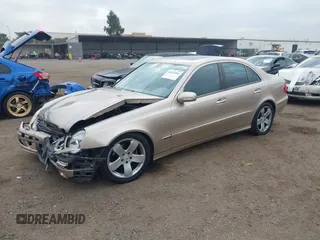 2005 Mercedes-Benz E-Class 3.2L with VIN WDBUF65J25A614469, listed as a IAAI auction lot 41521864 with 90,403 mi miles. Bid and sale history available at carsss.com. Image 2.