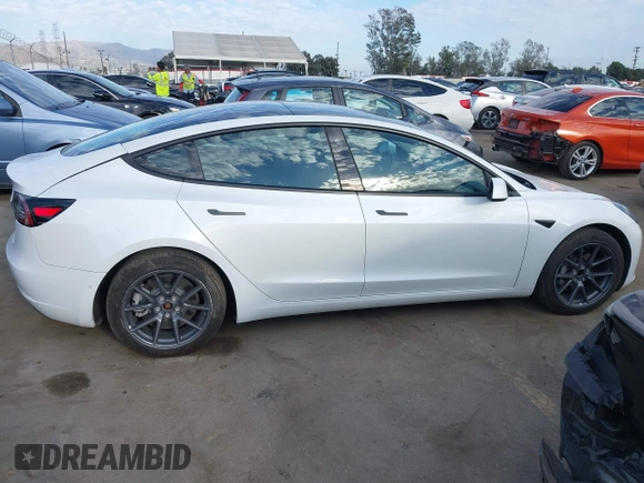 2022 Tesla Model 3 with VIN 5YJ3E1EA8NF210196, listed as a IAAI auction lot 41674407 with 24,270 mi miles. Bid and sale history available at carsss.com. Image 13.