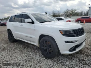 2015 Jeep Grand Cherokee SRT with VIN 1C4RJFDJ3FC918942, listed as a Copart auction lot 52078175 with 115,964 mi miles and Salvage Title. Bid and sale history available at carsss.com. Image 4.