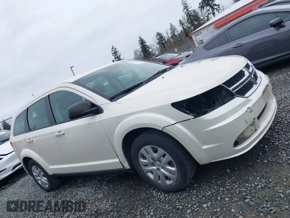 2015 Dodge Journey SE z VIN 3C4PDCAB6FT736330, wystawiony jako IAAI lot #41837047 z przebiegiem 123 567 mil mil oraz . Historia ofert i sprzedaży dostępna na DreamBid. Obrazek 14.