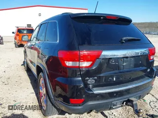 2013 Jeep Grand Cherokee Overland with VIN 1C4RJFCT1DC654653, listed as a IAAI auction lot 41826619 with 124,283 mi miles. Bid and sale history available at carsss.com. Image 3.