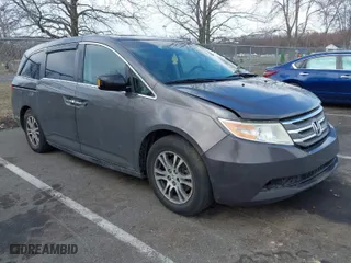 2012 Honda Odyssey EX-L with VIN 5FNRL5H63CB099357, listed as a IAAI auction lot 41851018 with 170,863 mi miles. Bid and sale history available at carsss.com. Image 1.