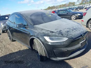 2023 Tesla Model X with VIN 7SAXCAE59PF377408, listed as a IAAI auction lot 41176738 with 32,496 mi miles and . Bid and sale history available at DreamBid. Image 1.