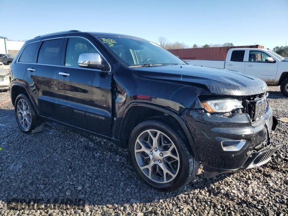2020 Jeep Grand Cherokee Overland with VIN 1C4RJFCG2LC230688, listed as a Copart auction lot 86249654 with 67,882 mi miles and Salvage Title. Bid and sale history available at carsss.com. Image 4.
