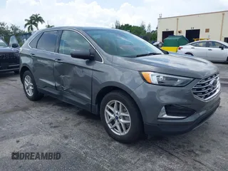 2022 Ford Edge SEL z VIN 2FMPK4J93NBB05677, wystawiony jako IAAI lot #42394622 z przebiegiem 64 776 mil mil oraz . Historia ofert i sprzedaży dostępna na DreamBid. Obrazek 1.