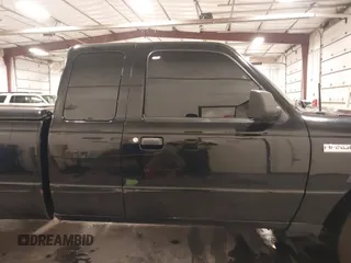 2009 Ford Ranger XLT with VIN 1FTZR45E79PA63934, listed as a IAAI auction lot 41441326 with 153,140 mi miles. Bid and sale history available at carsss.com. Image 14.