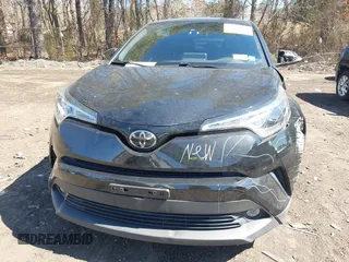 2019 Toyota C-HR XLE with VIN JTNKHMBXXK1019814, listed as a IAAI auction lot 41884485 with 53,101 mi miles. Bid and sale history available at carsss.com. Image 12.
