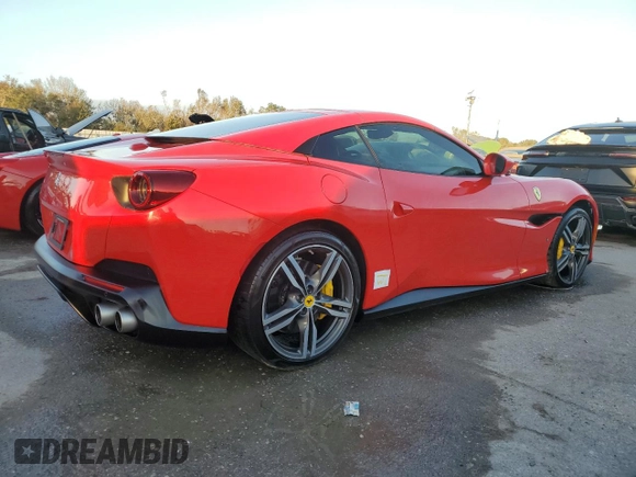 2019 Ferrari Portofino z VIN ZFF89FPA0K0242592, wystawiony jako Copart lot #74249014 z przebiegiem Nie podano mil oraz Nie do naprawy. Historia ofert i sprzedaży dostępna na DreamBid. Obrazek 3.