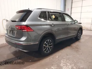 2021 Volkswagen Tiguan SE with VIN 3VV3B7AX3MM118463, listed as a IAAI auction lot 42138702 with 48,058 mi miles and . Bid and sale history available at DreamBid. Image 4.
