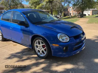 2004 Dodge Neon SRT-4 with VIN 1B3ES66S14D581763, listed as a Copart auction lot 76980654 with 76,376 mi miles and Clean Title. Bid and sale history available at carsss.com. Image 1.